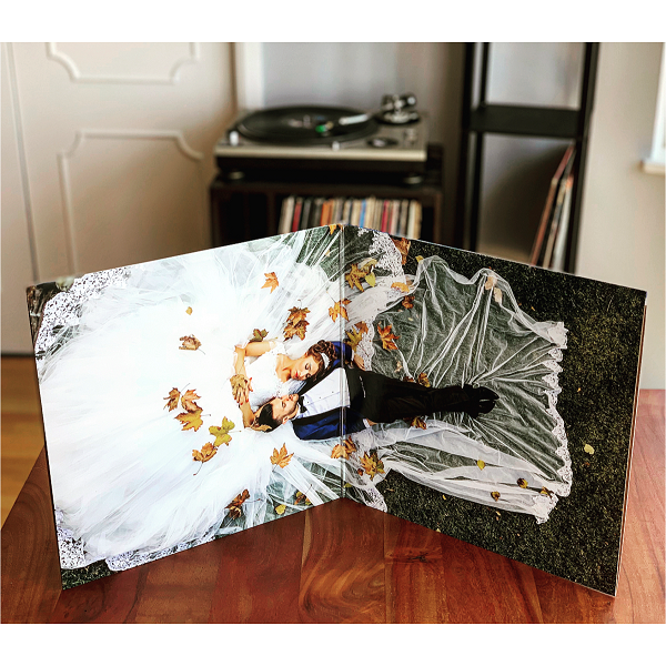 two custom vinyl records and a custom gatefold jacket